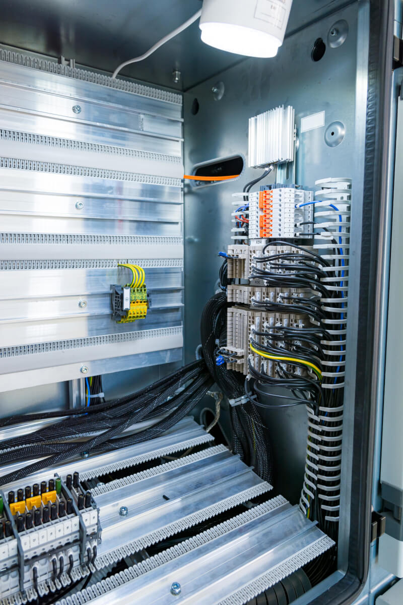 Interior of metal panel with connectors.